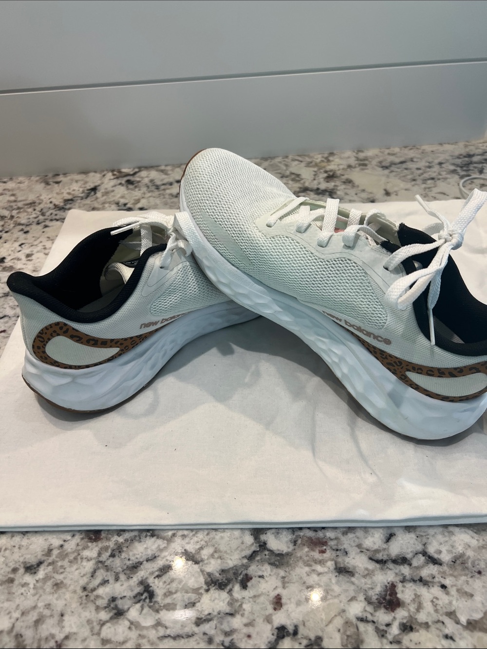New Balance White Athletic Sneakers with Leopard Print Accent